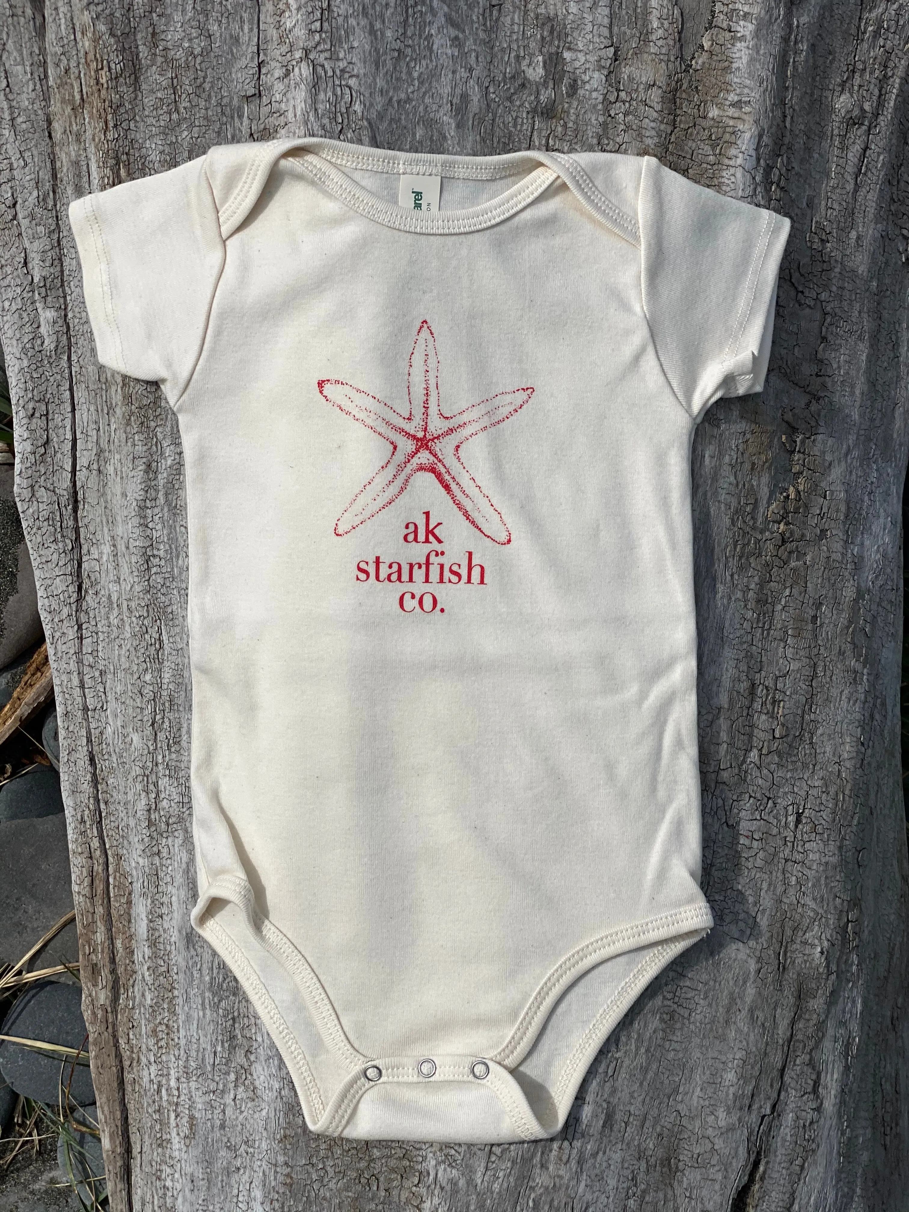 Pearl AK Starfish Co. Onesie